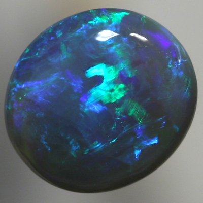 SOLID BLACK OPAL Rich greens and blues over dark purple